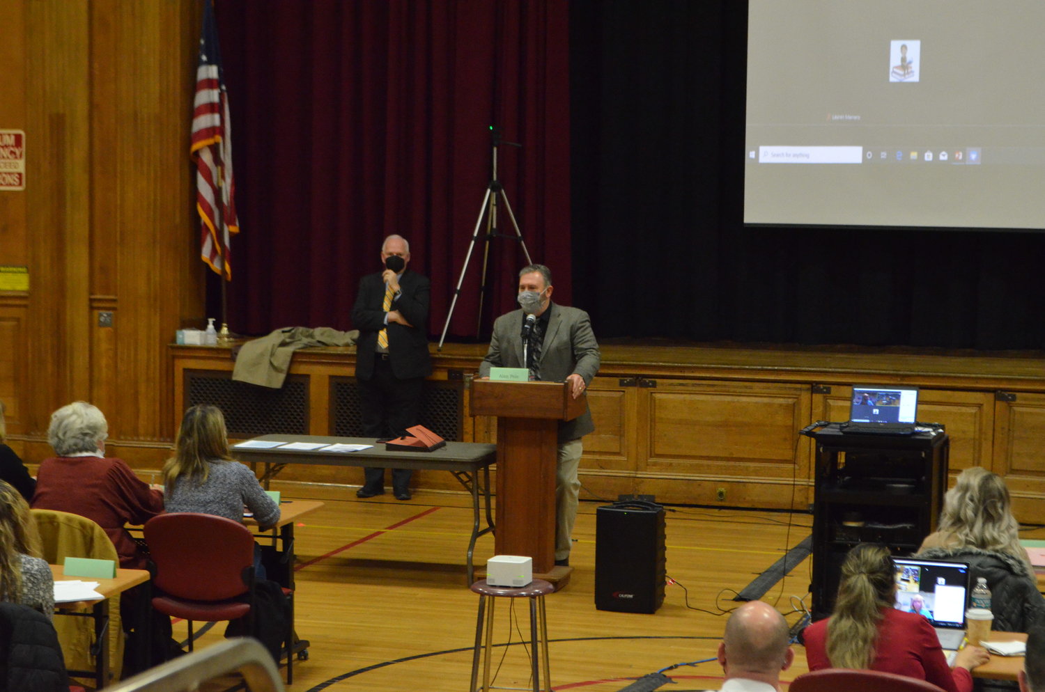 John Evans, at podium, introducing consultant Alan Pole at the March 1 meeting of the Livingston Manor-Roscoe merger study advisory committee.